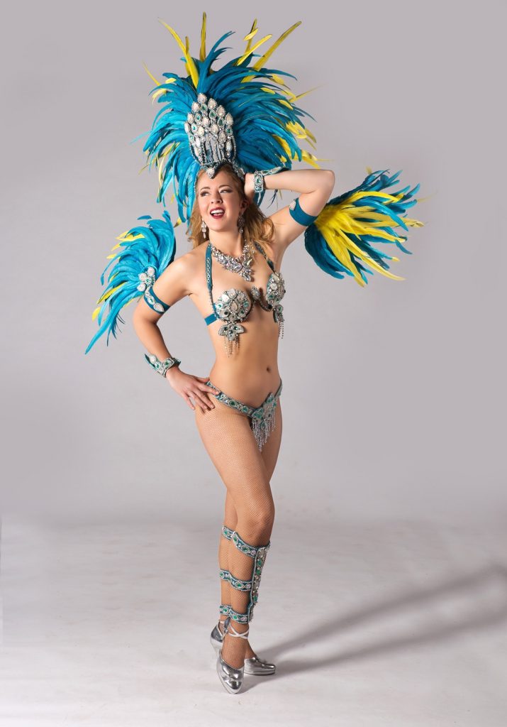 Vancouver Samba Dancer poses in Blue and Yellow samba costume by Miss Glamourosa